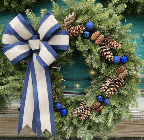 Kelly, our Master Wreath Maker, selects only the brush she knows will make the finest quality handmade Christmas wreaths.