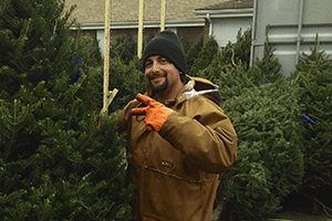 Uncle Steve demonstrating the pride he has in producing what we feel are the best balsam Christmas trees in New England